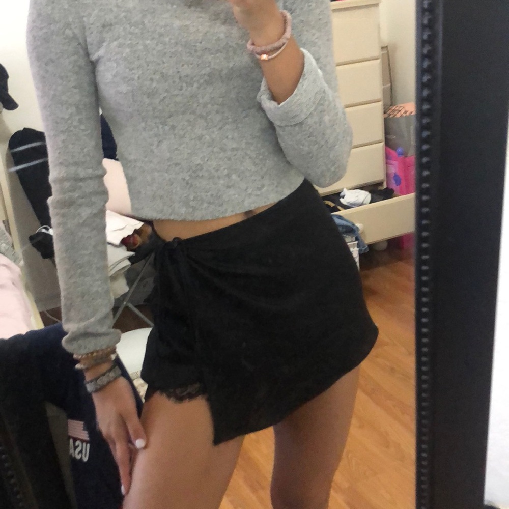 Black skirt with lace detailing and tie closure